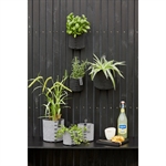 Outdoor Eco-felt plantepotte sort og grå på væg - Tinashjem